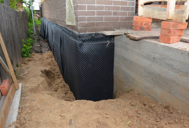 SJ Waterproofing Pros technician performing targeted Foundation Crack Repair assessment in Alpha, OH